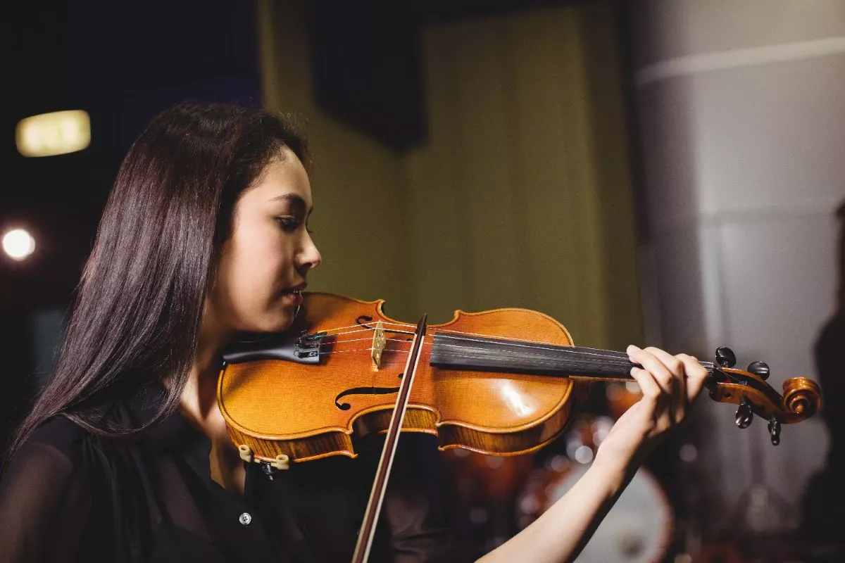 Intermediate violin student with pianist